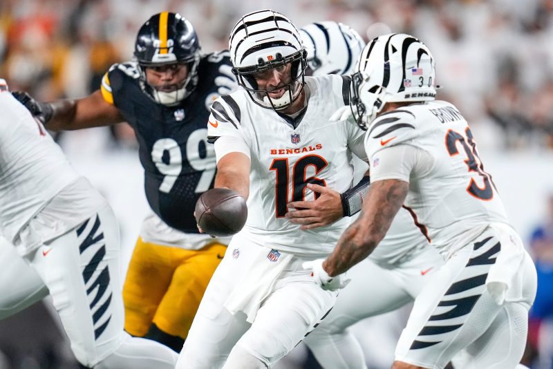 Joe Flacco won his first home start for the Bengals. Will it be the first of many this season?
Cincinnati has embarked on a three-game homestand but will see the Steelers again very soon.
As for the Browns? Expect their decisions to continue impacting their division’s outcome in 2025.
Week 18. Jan. 4, 2026. “Sunday Night Football.” Joe Flacco vs. Shedeur Sanders, flexed into prime time at Cincinnati’s Paycor Stadium with the AFC North title hanging in the balance.
OK, maybe this crystal ball is about as accurate as Flacco was with his previous team. But after watching the Bengals’ new/temporary/galvanizing/graybeard QB1 knock off the first-place Pittsburgh Steelers 33-31 on Thursday night while ending his latest club’s four-game slide, it’s already worth wondering: Are the lowly Cleveland Browns ultimately going to determine their division’s champion?
Steelers coach Mike Tomlin already gave the notion credence, seeing it coming from a mile away when he uncharacteristically lashed out Monday.
“Andrew Berry must be a lot smarter than me or us because it doesn’t make sense to me to trade a quarterback that you think enough of to make your opening day starter to a division opponent that’s hurting in that area,” Tomlin said of Cleveland’s general manager, who traded Flacco to the Joe Burrow-less Bengals last week.
“But that’s just my personal feeling.”
And it probably was a little bit … personal?
Tomlin, the NFL’s longest-tenured coach – hired by Pittsburgh in 2007 – has been combatting Flacco, 40, with mixed results, for most of the past 18 seasons. The still strong-armed Super Bowl 47 MVP has now faced the Steelers 26 times in his career, playoffs included and – yep – he’s been on the winning side against Tomlin 13 times. The Steelers coach was more circumspect amid the fresh Flacco fallout Thursday night.
“They did what was required to win – they made a few more plays than we did,” Tomlin said of the Bengals.
“I’d be remiss if I didn’t compliment them, they fought their tails off.”
But you think he and the Steelers wouldn’t have preferred the opportunity to work over Jake Browning, who was mostly abysmal in his three starts following the Week 2 toe injury Burrow sustained and is now trying to come back from, potentially at some point in December?
Flacco clearly enjoyed this latest chapter with Pittsburgh, saying Thursday night that many of his football war stories involve losses to the Steelers.
“I have so much respect for Mike and the battle that we’ve had,’ said Flacco as a smile broke across his face at the postgame podium. ‘I always find a way to play them. I love playing them.
“Those games against those guys – like in my career – those games have been different than others, just the physicality and the energy.
‘Nothing but respect for (Tomlin).”
The question now becomes: Have the Browns irreversibly − maybe even disrespectfully! − changed the AFC North’s stripes in 2025? Consider:
 The Bengals seem to have a new lease on life, starting a three-game homestand with Thursday’s win. Now, they can enjoy a 10-day interlude before hosting the winless New York Jets, with the Chicago Bears up after that. After a Week 10 bye, the Flacco-ful, Browning-less Bengals go to Pittsburgh, where they generally give the Steelers more problems than they typically do in Cincinnati.
 The Bengals’ schedule serves up Flacco’s original team, the Baltimore Ravens, in Week 13 (Thanksgiving) and 15, by which point Burrow could be close to a return … unless Flacco is the better option. Regardless, there’s now renewed hope − for both teams − that those could now be relevant matchups.
 And to extrapolate this just a bit more, Cleveland will face all of its divisional adversaries once more this season, including the Steelers in Week 17 and the Bengals in the regular-season finale. And the Browns obviously won’t be helmed by Flacco, who rolled off the couch to spark them to the playoffs in 2023 but struggled mightily last month while trying to operate a limited offense. Moving forward Cleveland will instead presumably still be evaluating rookie QB Dillon Gabriel and/or Sanders, arguably the highest-profile of their players – if one who hasn’t taken a regular-season snap. Yet. However, owner Jimmy Haslam has expressed a desire to see Sanders play at some point.
Got all that?
Meanwhile, the Steelers will have to hope 41-year-old quarterback Aaron Rodgers remains upright and can continue to dink and dunk Pittsburgh to the division crown. The Ravens hope their prodigiously talented roster, namely two-time MVP Lamar Jackson, can be sufficiently healthy down the stretch to salvage the season following a stunning, injury-marred 1-5 start. The Bengals, who finally left the gate 2-0 for the first time in the Burrow era, will have to hope he can get back – right? – to trigger the high-powered offense he advocated for before Cincy’s historically miserly front office essentially bet most of its cap space that Burrow and wideouts Ja’Marr Chase and Tee Higgins could finally lead this 57-year-old franchise out of The Jungle and to Lombardi Land.
Chase and Flacco seem to be enjoying an already near-instant rapport, hooking up 26 times for 255 yards and two TDs – most of that after Flacco’s first-half mulligan during his Bengals debut at Green Bay on Sunday. He’s even still trying to discern some of the play calls as they’re sifted through head coach Zac Taylor’s Oklahoma accent. But generally speaking? So far, so good.
“You hope you can come in here and play well,” Flacco said after beating the Steelers. “Now to go out there and have done it for like the last six quarters, I think it’s gonna give us a lot of confidence. And hopefully we can carry that over and use it to our advantage.”
He targeted Chase 23 times against Pittsburgh, more than the rest of Cincinnati’s players combined, hitting him 16 times for 161 yards and a score. Flacco finished with 342 yards and three TDs through the air, though Cincinnati’s offense was also unusally balanced for a change − churning out a season-high (by far) 142 rushing yards.
“Honestly, it’s been amazing,” Chase said on Prime Video’s postgame set.
As for the Browns? They don’t have their quarterback of the past – as in their Week 1 starter. Their quarterback(s) of the present have yet to win a game. Their quarterback of the future may arrive via one of their two first-round picks in 2026. And Cleveland is clearly more incentivized to offload veterans like Flacco – at the mere cost of upgrading a sixth-round draft pick to a fifth next year – than trying to win as many games as possible in the moment.
It’s an approach that’s already cost the Steelers and could have further repercussions.
And Bengals fans know it, appropriately chanting after Thursday’s potentially season-salvaging triumph: “Thank you, Cleveland.”
This post appeared first on USA TODAY Who runs the AFC North? Just maybe Joe Flacco … and the Browns