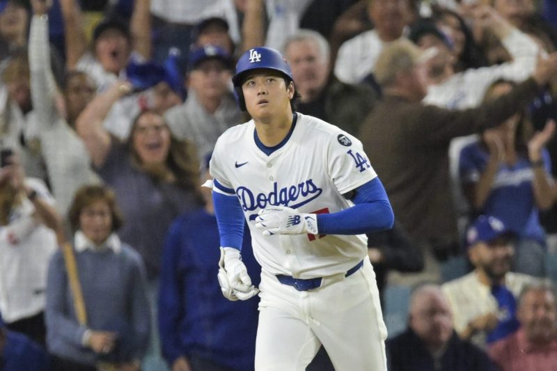 LOS ANGELES — Shohei Ohtani continues to prove why he’s the best player in baseball.
Ohtani propelled the Los Angeles Dodgers to a 5-1 win against the Milwaukee Brewers in Game 4 of the National League Championship Series, pitching six innings of brilliant ball while launching three home runs.
‘That was probably the greatest postseason performance of all time,’ Dodgers manager Dave Roberts said. ‘There’s been a lot of postseason games. And there’s a reason why he’s the greatest player on the planet.
‘What he did on the mound, what he did at the plate, he created a lot of memories for a lot of people. So for us to have a game-clinching — to do it in a game-clinching game at home, wins the NLCS MVP, pretty special. I’m just happy to be able to go along for the ride.’
Ohtani was the starting pitcher and provided all the run support the Dodgers needed, with solo home runs in the first, fourth and seventh innings. His performance helped complete the sweep of the Brewers as the Dodgers advanced to the World Series for the second consecutive year.
Ohtani’s pitching performance, which ended when he was lifted in the seventh, concluded another stellar night from the Dodgers’ starting pitchers, following Blake Snell, Yoshinobu Yamamoto and Tyler Glasnow.
He walked the Brewers’ leadoff hitter, Brice Turang, before striking out Jackson Chourio, Christian Yelich and William Contreras in order. He finished the night with 10 strikeouts, becoming the first player to strike out 10 and hit three homers in a game, per Sarah Langs.
‘I really focused on, first and foremost, as a starting pitcher to make sure I’m an effective starting pitcher,’ Ohtani said. ‘On the hitting side, looking at the entire team, we will see that at times the right-handed hitters picked us up. And on the flip side, sometimes the left-handed hitters picked us up. So in a sense we’re just trying to find the right balance.’
Ohtani provided an early spark at the plate with a solo home run in the bottom of the first inning to give the Dodgers a 1-0 lead. His teammates provided further run support in the first as Mookie Betts and Will Smith scored runs to give the Dodgers a 3-0 lead.
‘I think there was a lot of talk that he was scuffling at the plate; he doesn’t swing the bat well when he’s pitching. And all those things I think were fuel to his fire,’ Roberts said. ‘Today, when he took the mound, you can see the focus, the intent. And after that shutdown first inning, just the at-bat right there, you could see that he was smelling a really good night tonight.’
Jackson Chourio managed to get the Brewers’ first hit in the top of the fourth inning, ending Ohtani’s chance at a no-hitter.
But Ohtani launched a ball 469 feet toward center field for his second home run in the bottom of the fourth against Brewers pitcher Chad Patrick. He then got his third in the bottom of the seventh.
Shohei Ohtani stats: Dodgers vs. Brewers results 
<strong>Batting</strong>: 3-for-3, 3 HR, 3 RBI, 1 BB
<strong>Pitching</strong>: 6 innings, 0 ER, 2 hits, 3 walks, 10 strikeouts
Shohei Ohtani highlights vs. Brewers
This post appeared first on USA TODAY Shohei Ohtani has historic performance to NLCS MVP