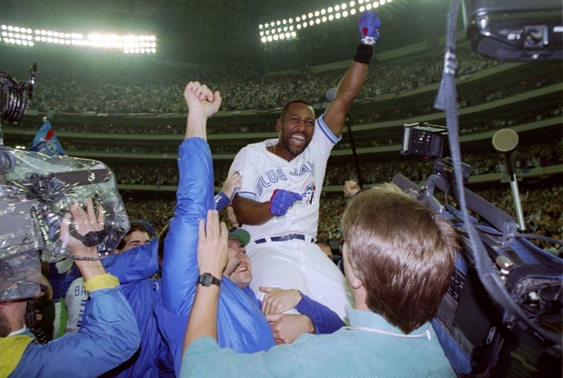 Joe Carter’s walk-off home run clinched the 1993 World Series in Toronto.
Blue Jays are back in the Fall Classic for first time since their last title.
Carter played 17 MLB seasons and won two championships with Toronto.
Joe Carter, the man who hit the biggest home run in Toronto Blue Jays history, sat in his home theater and watched history repeat itself more than three decades later.
It was like an out-of-body experience, watching a near replay of himself, circling the bases, jumping up and down after hitting the game-winning home run in the 1993 World Series that made him a Canadian national hero.
Now, nearly 32 years to the day, George Springer etched his name forever in Blue Jays folklore, hitting a dramatic three-run, seventh-inning home run to lift the Blue Jays into the World Series past the Seatle Mariners, 4-3.
The sellout crowd of 44,770 at the Rogers Centre screamed in euphoria.
Carter screamed in his house, startling his wife and daughter who were pacing upstairs, with his whole neighborhood in Leawood, Kansas hearing the jubilation.
“This is crazy, this is so crazy,’ Carter told USA TODAY Sports. “My heart was beating 10,000 beats a second, and I’m not even playing. It’s hard on a 65-year-old man.’
The moment Springer’s ball landed into the left field seats, Carter knew exactly what he’s going to say to Springer when he sees him before Game 1 of the World Series against the Los Angeles Dodgers on Friday.
“Welcome to the three-run home run club!
“You look at me. You look at Jose Bautista. You look at Edwin Encarnacion. And now, you look at George Springer.
“Unbelievable.’
Carter got emotional watching Springer’s reaction, jumping up and down, rounding the bases, thrusting his arms into the air.
It was the only the third go-ahead homer in the seventh inning or later in a Game 7 in postseason history, joining Pittsburgh Pirates’ Hal Smith in the 1960 World Series and Washington Nationals’ Howie Kendrick in the 2019 World Series. And Springer is the only one in history to achieve the feat with his team trailing by multiple runs.
It brought back the memories of that night in the same building, Oct. 22, 1993, when the Blue Jays trailed the Philadelphia Phillies, 6-5, in the ninth inning of Game 6 of the World Series. There were two runners on when Carter came to the plate, and he smacked a three-run homer off Phillies closer Mitch Williams into the left-field seats, winning the World Series championship.
It was only the second home run to end a World Series in baseball history, joining Bill Mazeroski with the 1960 Pittsburgh Pirates.
“I told my wife, ‘Sweetheart, now know I know you felt when you were in the stands I was at the plate,” Carter said. “I was so nervous. My heart was beating so fast.
“And then he did it. He really did it. I couldn’t believe it.’
Carter was trading text messages with John Smoltz, the Hall of Fame pitcher and Fox analyst during the game, and just when the Blue Jays were about to open the bottom of the seventh, he sent one more text to Smoltz:
“Looking for a hero.’
The inning opened with a walk by Addison Barger and a single by Isiah Kiner-Falefa, with No. 9 hitter Andres Gimenez laying down a sacrifice bunt. Springer, who suffered a badly bruised knee in Game 5 in Seattle, stepped up and drilled a 1-and-0, 96-mph fastball off Mariners reliever Eduard Bazardo into the seats.
Carter found his hero.
Then, I held my breath the last two innings,’ Carter said. ‘I did not want to see Cal Raleigh come to the plate.’
Instead, Raleigh, who homered earlier in the game, was left standing on the on-deck circle as closer Jeff Hoffman struck out the side.
“Now, those guys don’t have to talk about ’93 anymore,’ Carter said. “I’m so glad. For them to go from worst to first, and now to the World Series.’
Carter was just in Toronto three weeks ago filming a team commercial with Springer designed to fire up the crowd, with Carter letting the fans know that since they did it in the past, they can sure do it now.
And now, Carter and Springer may be together for the next 20 years in autograph shows, hitting the two most famous homers in Blue Jays history.
“I was so happy for him,’ Carter said. “It was like poetic justice. The guy gets hit in the knee and the fans are booing him. You kidding me? Well, now those fans in Seattle will have a lot to boo George Springer about, he’ll be remembered in their history.’
Carter played 17 years in the big leagues for four different teams but Toronto has a special place in his heart. This is where he spent seven years, winning back-to-back World Series championships and a place he calls his second home – where he has had his celebrity golf tournament the past 15 years.
“This means so much to everyone in Toronto, really, all of Canada,’ Carter said. “I just remember how much joy we brought to everyone. But that was a long time ago. There are a lot of Blue Jays’ fans who weren’t alive when we won those championships.
“Now, they get to make their own memories, and wow, what a memory.’
Carter will be traveling to Toronto for the World Series where he’s expected to throw out the ceremonial first pitch at one of the games, saying, ‘They’ve saved me for the last 32 years, I’m due.”
And when he sees everyone, he’ll let them know that it’s not enough to just get to the World Series. As long as they’ve gone this far, they might as well win it.
“It’s fun getting there, but you just didn’t get there to get there, you got to win the whole thing,’ Carter said. “Don’t be happy just getting there, let’s win it. I know you’re the underdog. You’re going against the $1 billion payroll and the super-human guy in Shohei Ohtani. Those guys are a first-class organization with their arms and Mookie Betts and Freddie Freeman.’
The Dodgers are trying to go where only two teams have ever gone in the last 50 years, winning back-to-back World Series titles like the Blue Jays in 1992-1993.
Carter would love for the Blue Jays to stop the Dodgers from joining their elite company.
“The Dodgers are good, but the Blue Jays have that championship pedigree,’ Carter said. “It showed in their DNA when they lost the first two games at home, then went to Seattle where they had to win, and come back home where they had to win.
“I’m telling you, we can do it. The city of Toronto is going to be rocking. All of Canada is going to be so pumped up. And, I’m so pumped up.
“This is going to be a classic.’
<strong><em>Follow Nightengale on X: @Bnightengale</em></strong>
This post appeared first on USA TODAY Exclusive: Blue Jays World Series hero can’t believe epic Game 7 HR